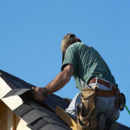 Man working alone on a roof